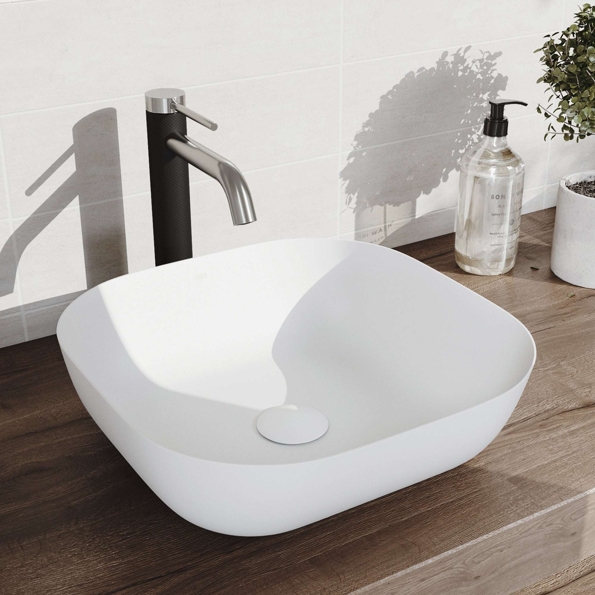 Low flow vessel faucet with included mounting hardware and supply lines