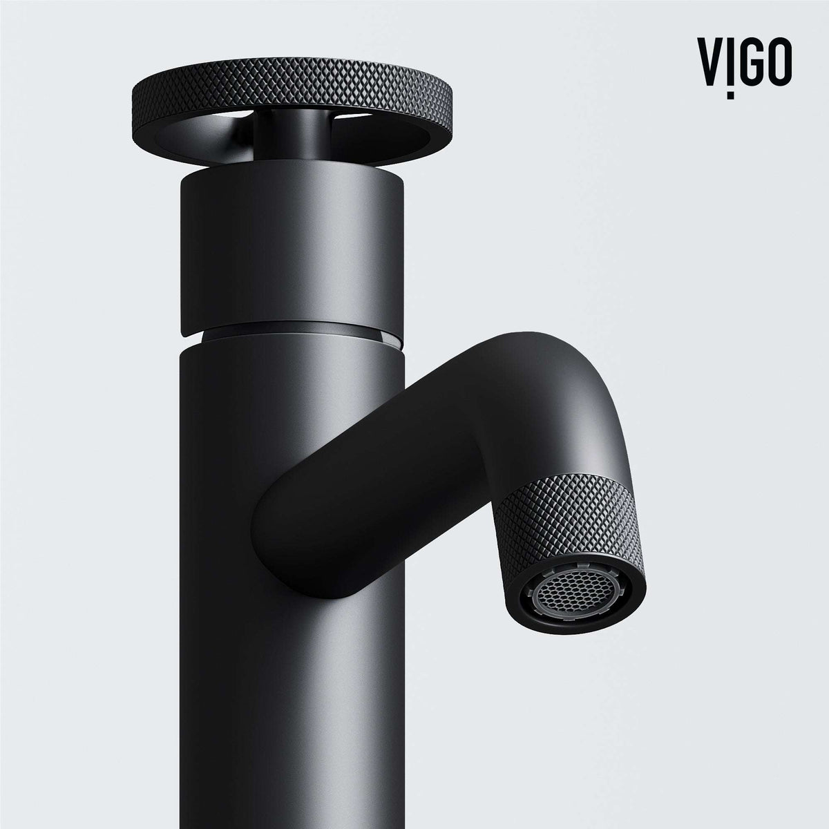 Matte black faucet featuring knob handles and modern design