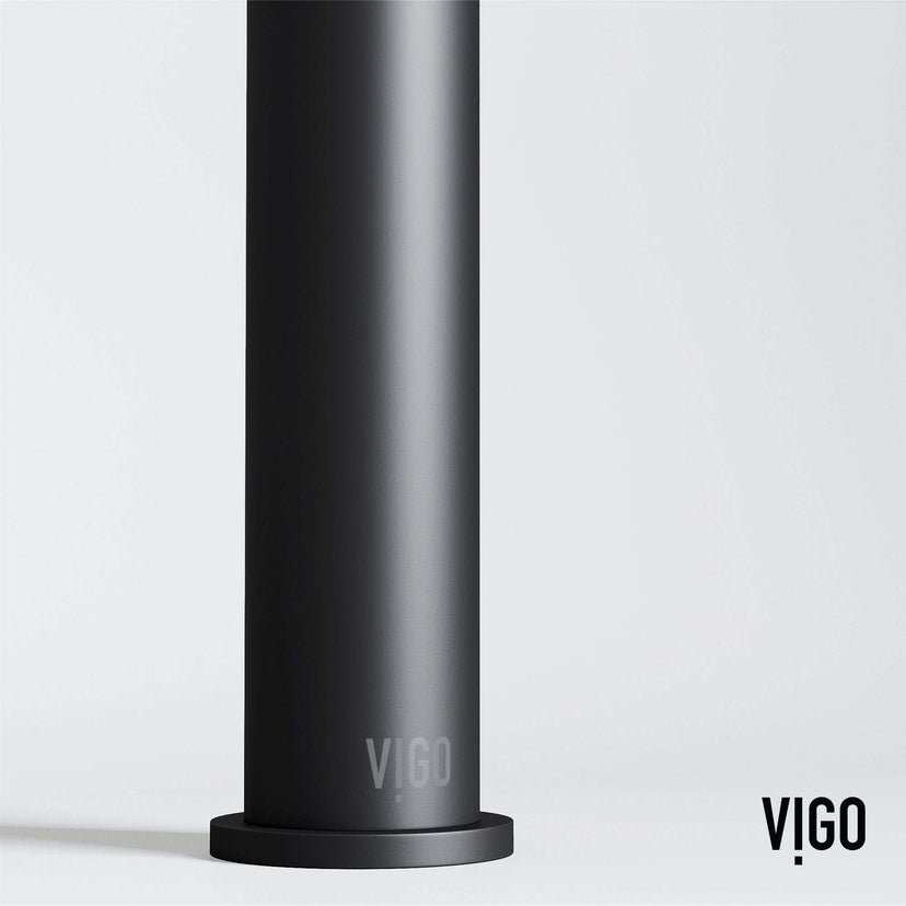 Deck-mounted vessel filler in matte black with included handles and supply lines