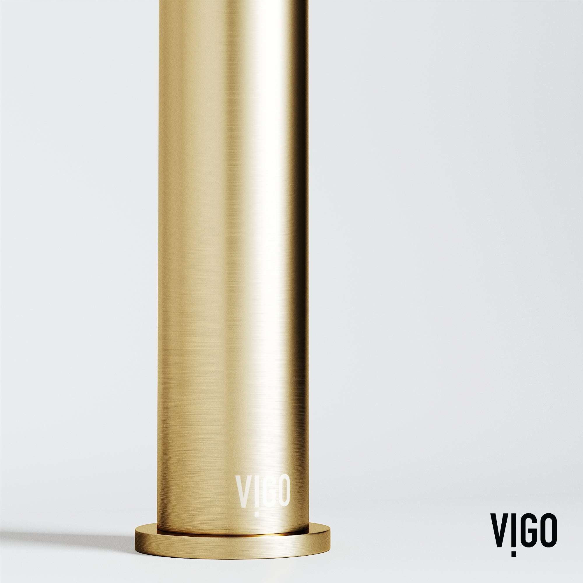 Deck-mounted vessel filler in matte brushed gold with included handles and supply lines