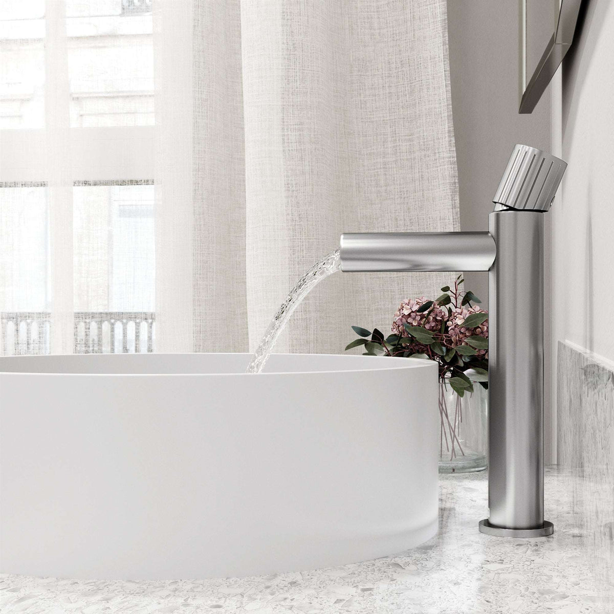 Brushed nickel faucet featuring lever handle and compression connection