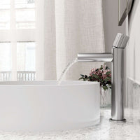 Brushed nickel faucet featuring lever handle and compression connection