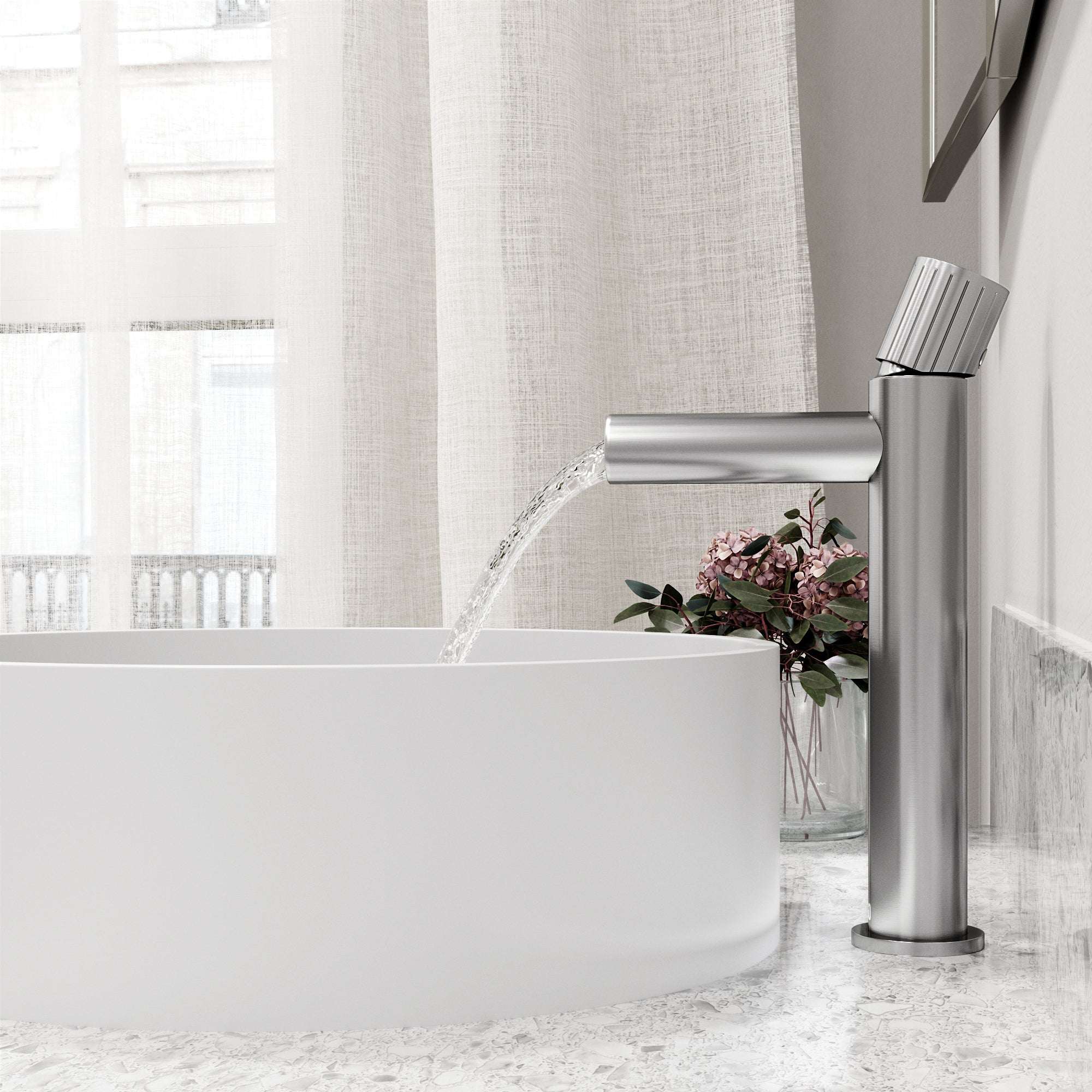 Brushed nickel faucet featuring lever handle and compression connection