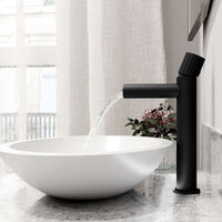 Matte black faucet featuring lever handle and compression connection