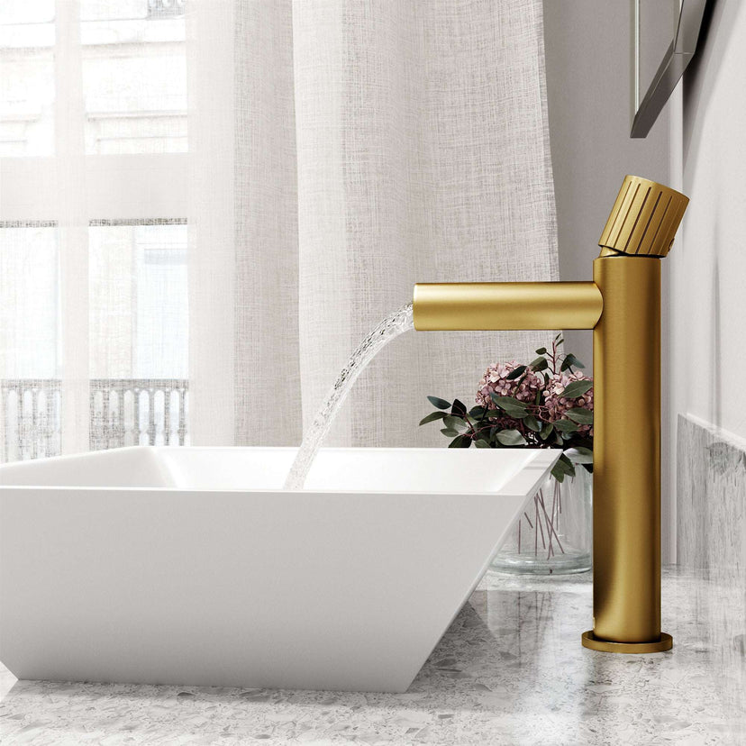 Matte brushed gold faucet featuring lever handle and compression connection