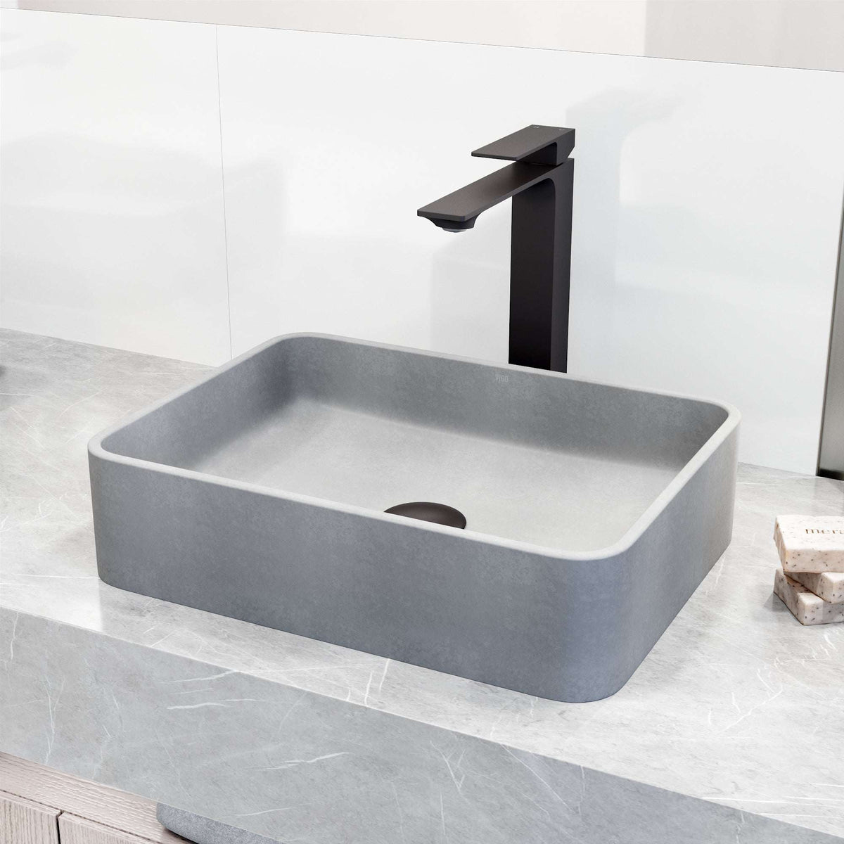 Matte black faucet featuring lever handle and low flow design