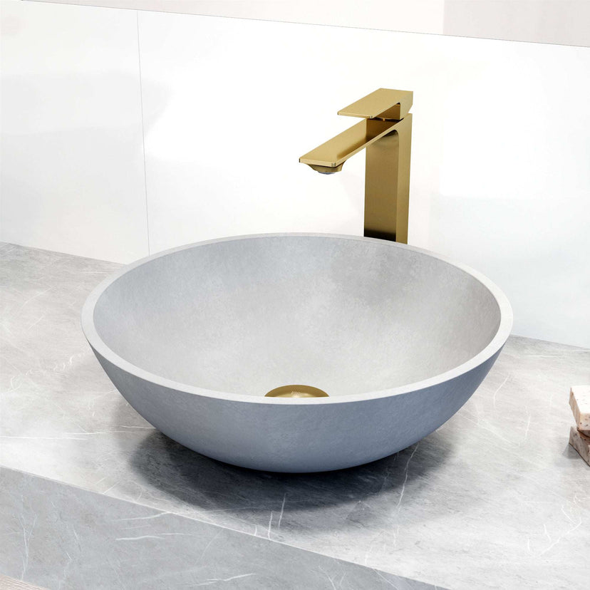 Matte brushed gold faucet featuring lever handle and low flow design