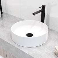 Modern deck-mounted bathroom faucet in matte black finish