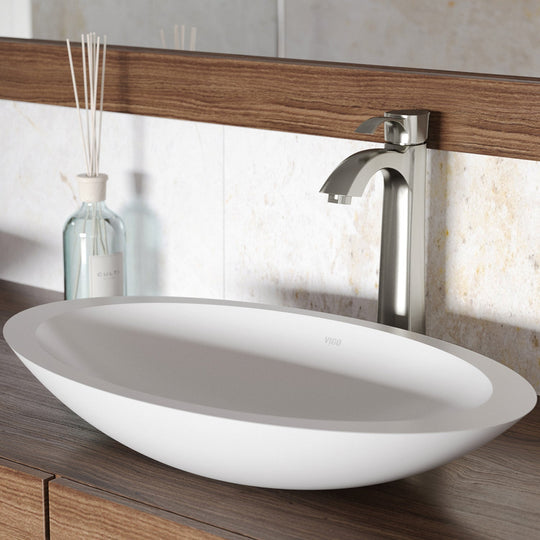 Matte stone vessel sink with contemporary design