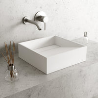 Square matte white cast stone vessel sink with modern contemporary style