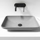 Gray concrete vessel sink with rectangular shape and modern design
