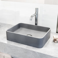 Handmade gray concrete sink for bathroom with vessel installation