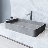 Gray concrete vessel sink with rectangular shape and modern design