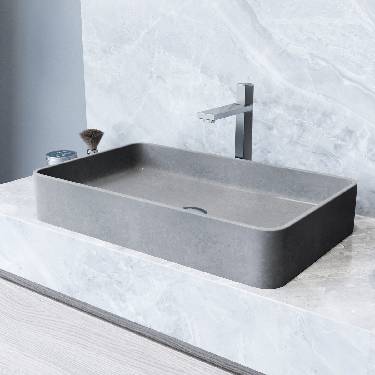Gray concrete vessel sink with rectangular shape and modern design
