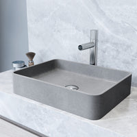 Gray concrete vessel sink with rectangular shape and modern design