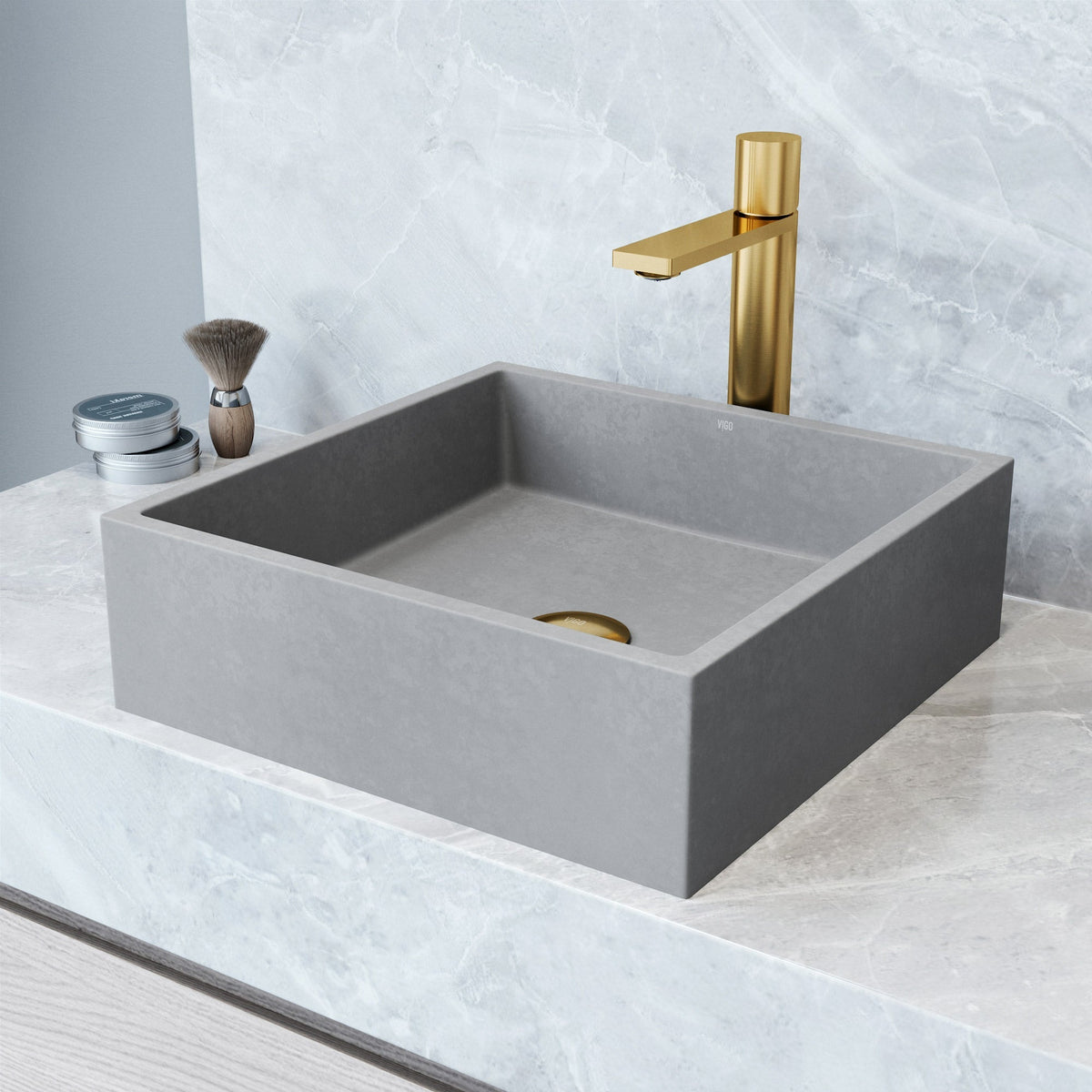 Gray concrete vessel sink with square shape and modern design