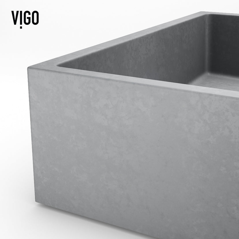 Gray concrete sink with vessel installation and rectangular design