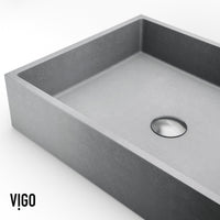 Contemporary rectangular sink featuring handmade concrete construction