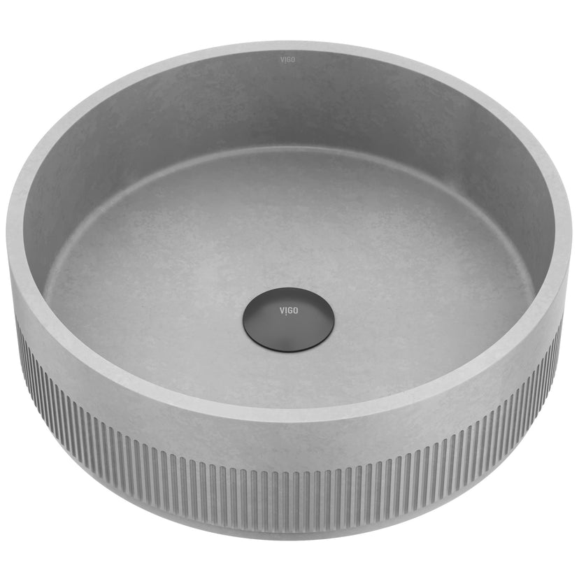 Modern round vessel sink in gray concrete for contemporary bathroom design