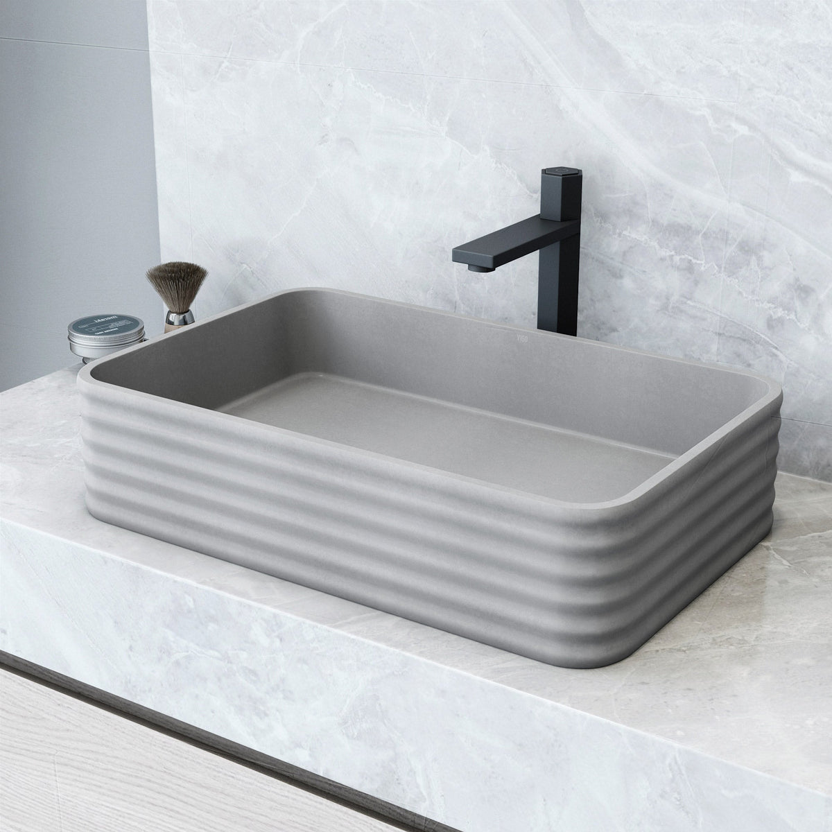 Gray concrete vessel sink with rectangular shape and modern design