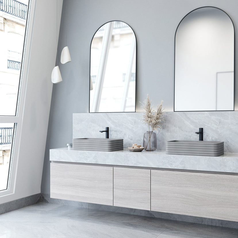 Commercial-grade gray concrete vessel sink with rectangular form