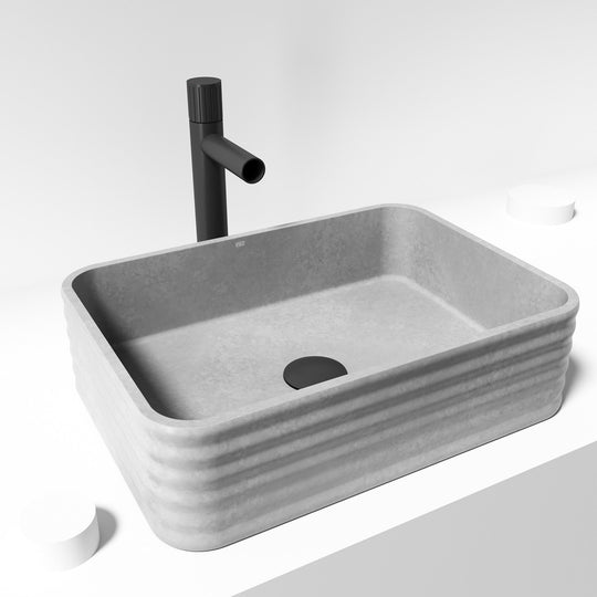 Gray concrete vessel sink, rectangular, suitable for commercial bathrooms
