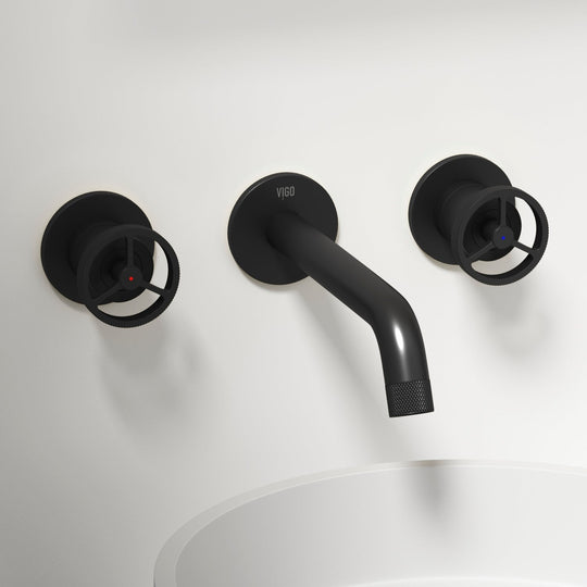 Matte black wall mount bathroom faucet with low arc spout and knob handles