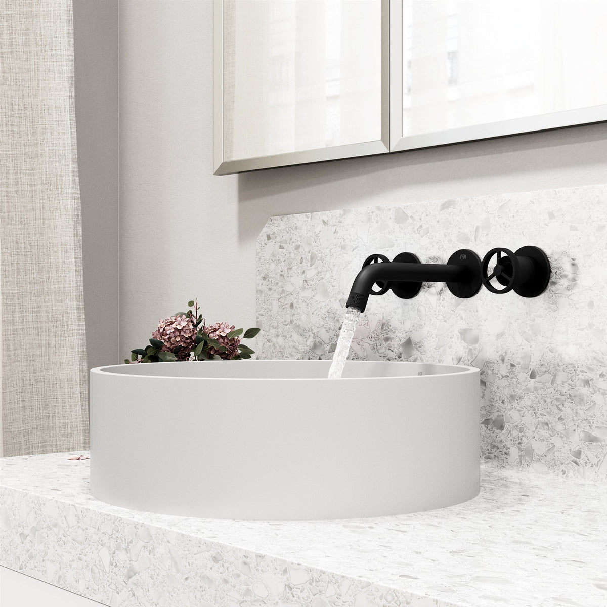 Brass cartridge wall mount faucet featuring hot/cold indicators and fingerprint resistant finish