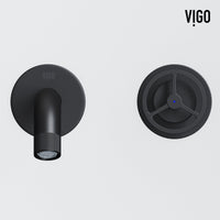 Matte black faucet with knob handles and low arc spout for modern bathrooms