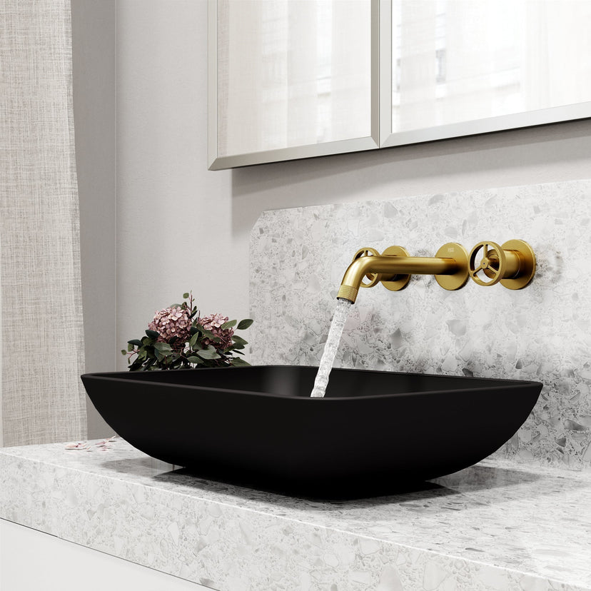 Brass cartridge wall mount faucet featuring hot/cold indicators and fingerprint resistant finish