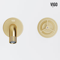 Matte brushed gold faucet with knob handles and low arc spout for modern bathrooms