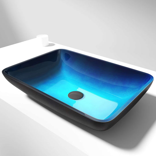 Glass vessel sink with modern design and turquoise water color for bathrooms
