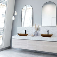 Glass vessel sink with modern design and amber color for bathrooms