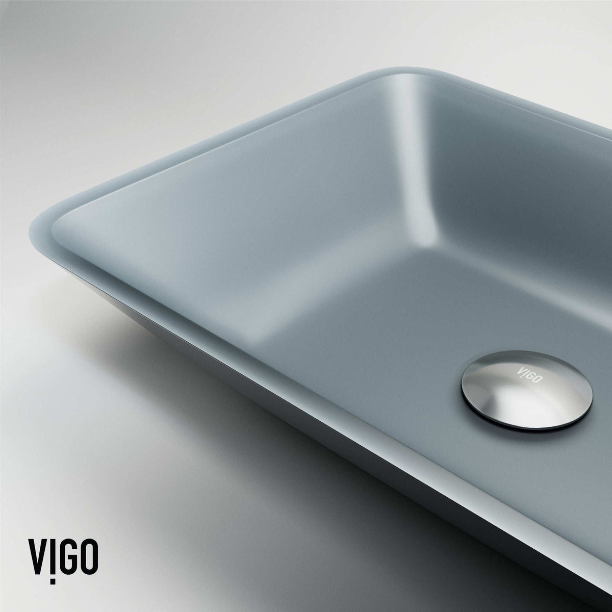 Rectangular glass vessel sink with handmade craftsmanship and metallic color
