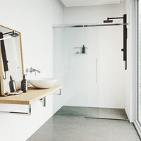 Wall-mounted shower system with body jets, flexible hose, and knob handles