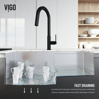 Rectangular undermount sink featuring strainer, drain cover, and silicone grid