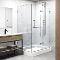 Frameless shower enclosure with included base and mounting hardware