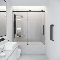 Stainless steel hardware on matte black frameless sliding door with clear glass