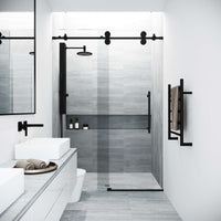Modern frameless shower door with matte black hardware and cool touch exterior