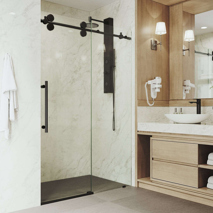 Frameless shower door with matte black finish, 74 in. height, and cool touch exterior