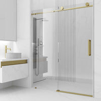Matte gold frameless sliding shower door with tempered clear glass and VMotion technology