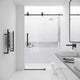 Adjustable width sliding shower door with matte black finish and clear glass, 76 in. tall