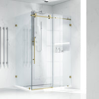 Frameless shower door with matte brushed gold finish, bar handle, and reversible door installation