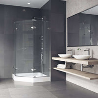Frameless shower enclosure with chrome finish and included base