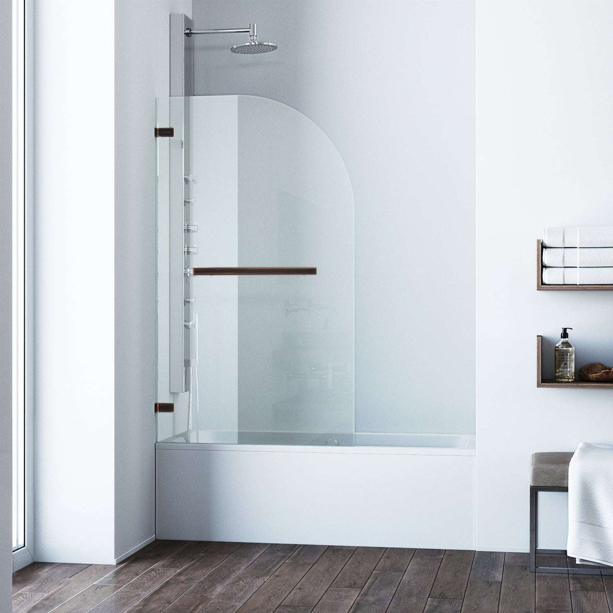 Frameless tub door with antique rubbed bronze finish and tempered clear glass
