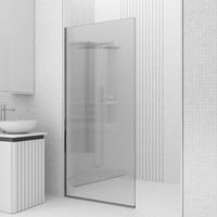 Modern chrome shower screen featuring fluted tempered glass and reversible door installation