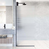 Frameless matte black shower screen with fluted tempered glass and reversible door