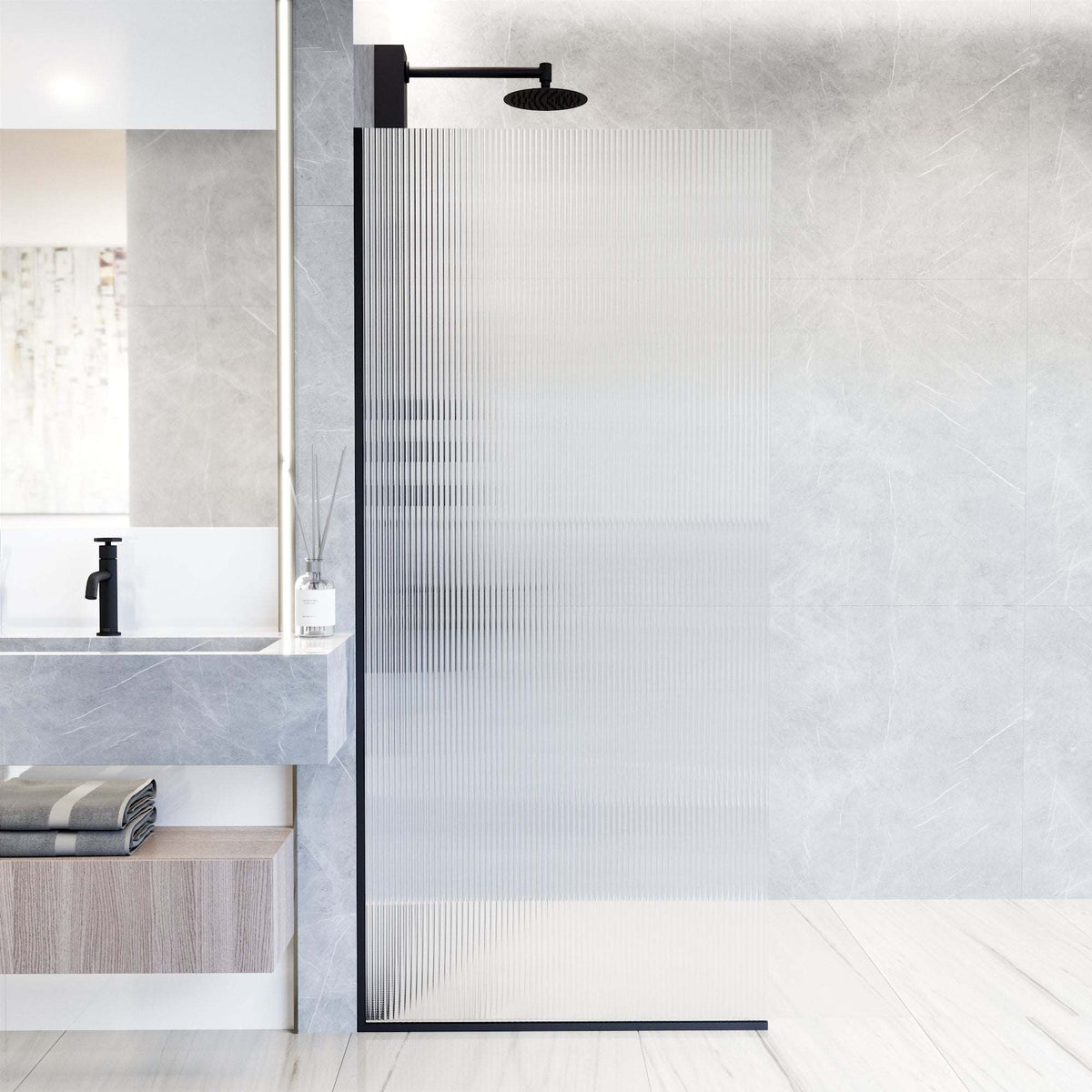 Frameless matte black shower screen with fluted tempered glass and reversible door