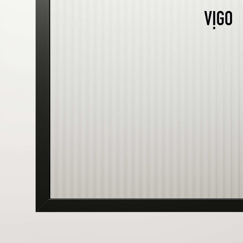 Matte black frameless shower screen with fluted glass, reversible door, and tempered safety glass