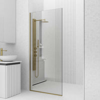Fixed installation shower screen with matte gold frame, clear tempered glass, and 74-inch height
